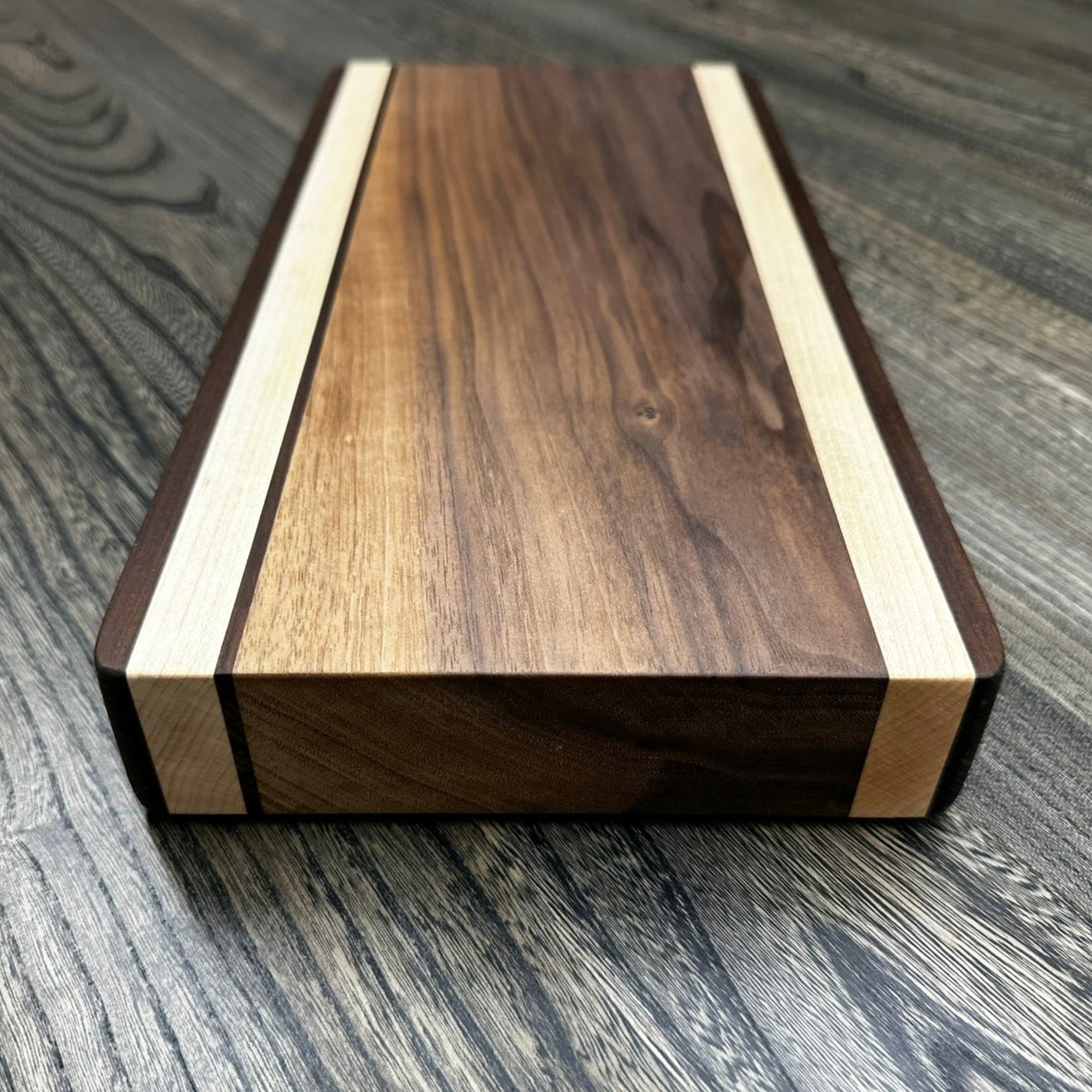Maple & Walnut Cutting Board by Klara